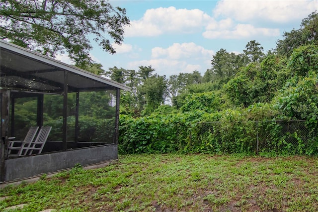 3129 W Paris St, Tampa, FL 33614 - view of yard featuring a sunroom