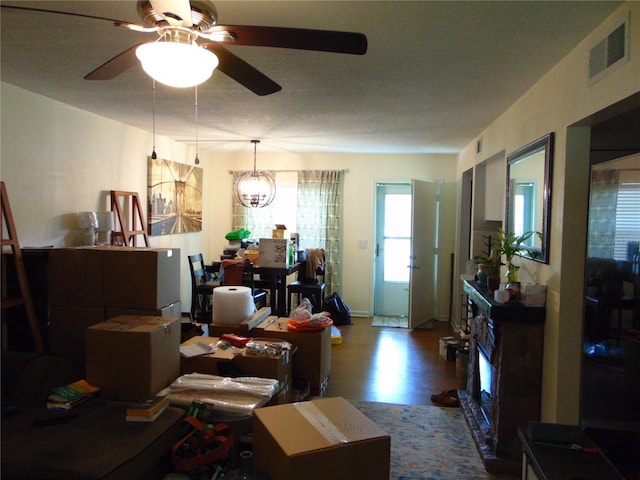 1250 S Pinellas Ave Unit 307, Tarpon Springs, FL 34689 - living area with wood finished floors and a ceiling fan