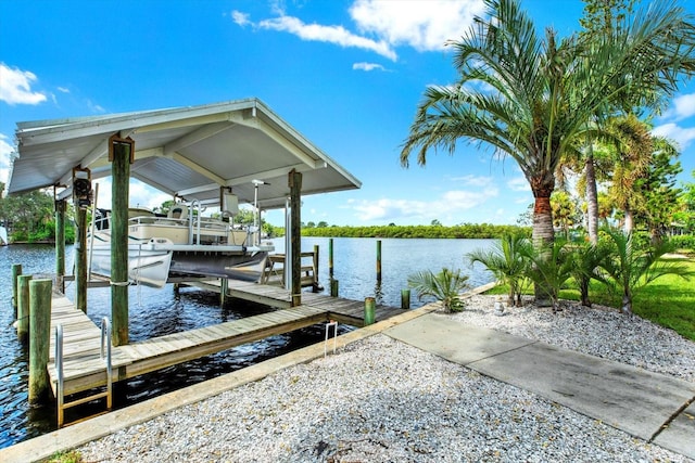 102 W N Branch Rd, Ruskin, FL 33570 - dock area featuring boat lift and a water view