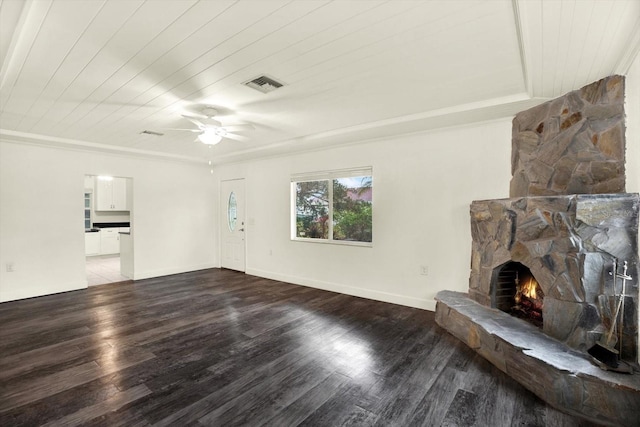 102 W N Branch Rd, Ruskin, FL 33570 - living area with a fireplace, wood finished floors, a ceiling fan, and crown molding