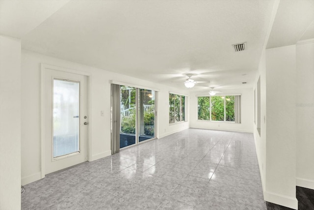 102 W N Branch Rd, Ruskin, FL 33570 - spare room featuring ceiling fan and granite floors