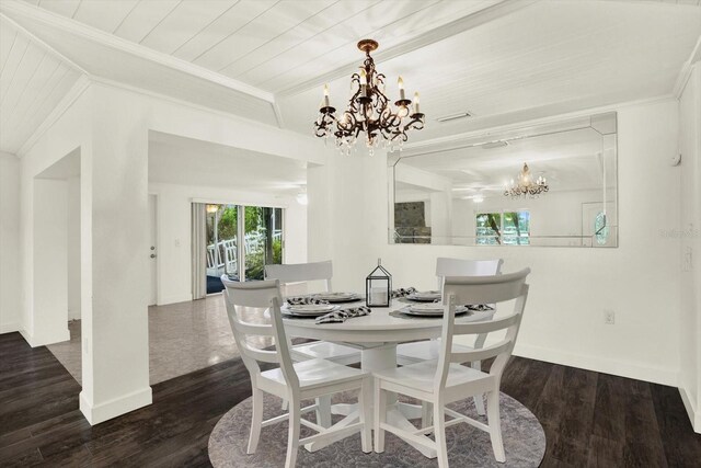 102 W N Branch Rd, Ruskin, FL 33570 - dining area with a chandelier, crown molding, wood finished floors, and wood ceiling