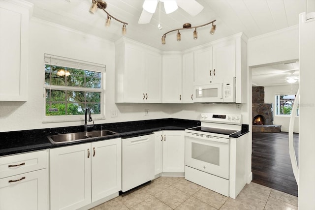 102 W N Branch Rd, Ruskin, FL 33570 - kitchen featuring white appliances, a ceiling fan, ornamental molding, and white cabinetry