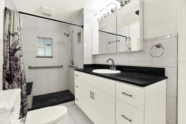 102 W N Branch Rd, Ruskin, FL 33570 - full bathroom with vanity, a tile shower, and tile walls