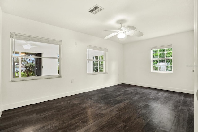 102 W N Branch Rd, Ruskin, FL 33570 - spare room with dark wood-style flooring and a ceiling fan