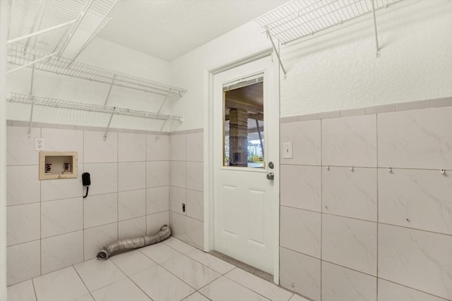 102 W N Branch Rd, Ruskin, FL 33570 - washroom featuring hookup for a washing machine and tile walls