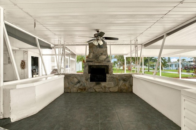 102 W N Branch Rd, Ruskin, FL 33570 - view of patio with a ceiling fan and a fireplace