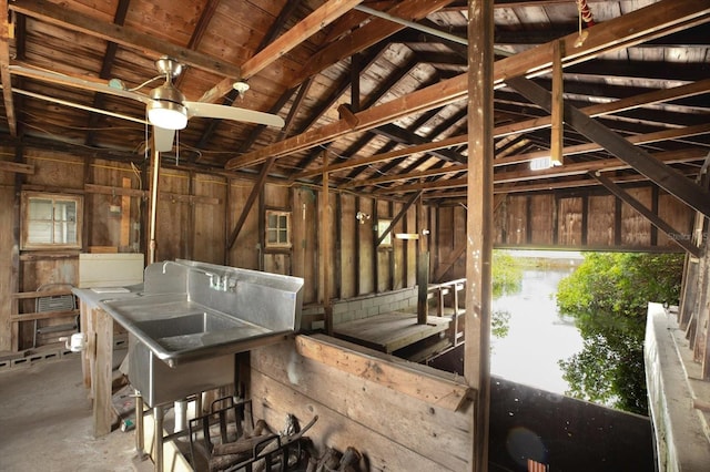 102 W N Branch Rd, Ruskin, FL 33570 - misc room with unfinished concrete floors and vaulted ceiling