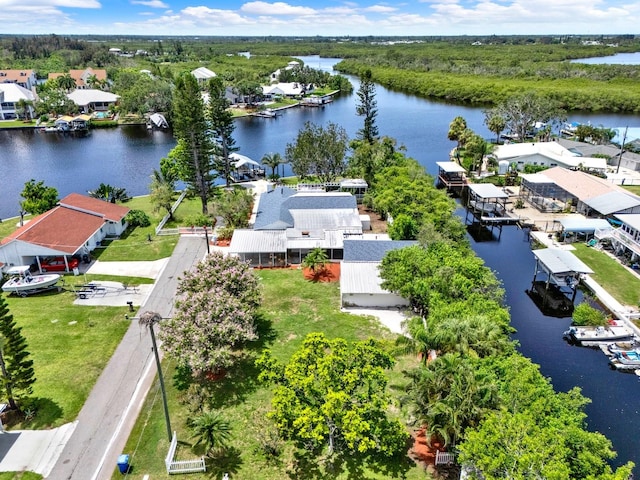102 W N Branch Rd, Ruskin, FL 33570 - aerial perspective of suburban area featuring a nearby body of water