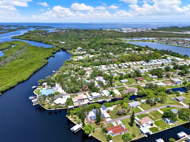 102 W N Branch Rd, Ruskin, FL 33570 - aerial view of property and surrounding area featuring a nearby body of water and nearby suburban area