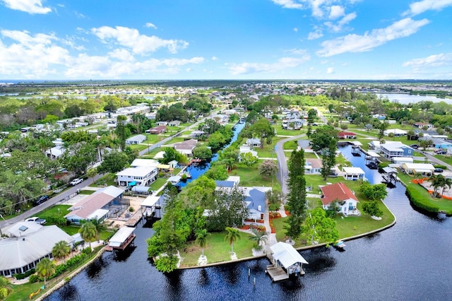 102 W N Branch Rd, Ruskin, FL 33570 - aerial view of residential area with a large body of water