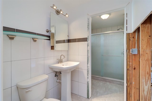 123 11th Ave, Indian Rocks Beach, FL 33785 - bathroom featuring tile walls and a stall shower
