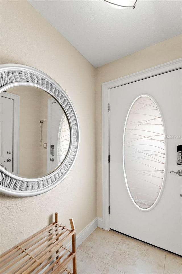 300 Capri Blvd Unit 3, Treasure Island, FL 33706 - foyer entrance featuring light tile patterned flooring