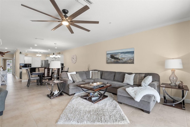 300 Capri Blvd Unit 3, Treasure Island, FL 33706 - living area featuring ceiling fan, a chandelier, ornamental molding, light tile patterned floors, and recessed lighting