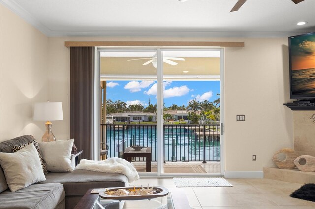 300 Capri Blvd Unit 3, Treasure Island, FL 33706 - living room featuring ceiling fan, tile patterned floors, ornamental molding, plenty of natural light, and recessed lighting