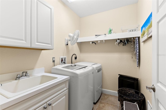 300 Capri Blvd Unit 3, Treasure Island, FL 33706 - laundry room with cabinet space, washing machine and dryer, and light tile patterned floors
