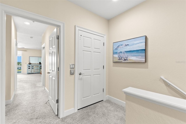 300 Capri Blvd Unit 3, Treasure Island, FL 33706 - corridor with light colored carpet and recessed lighting