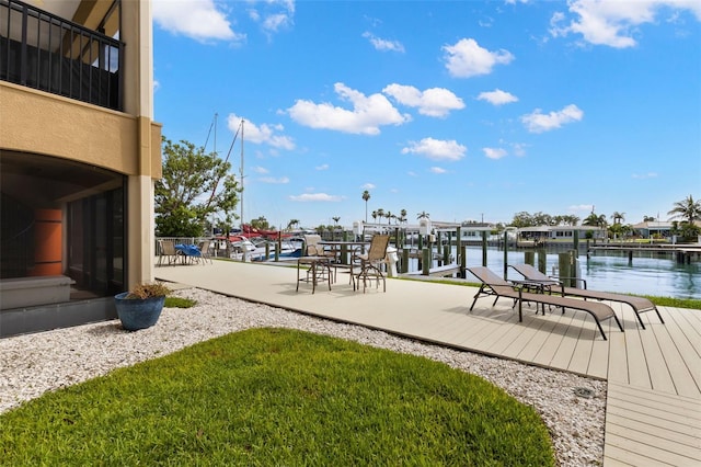 300 Capri Blvd Unit 3, Treasure Island, FL 33706 - exterior space with a boat dock and a water view