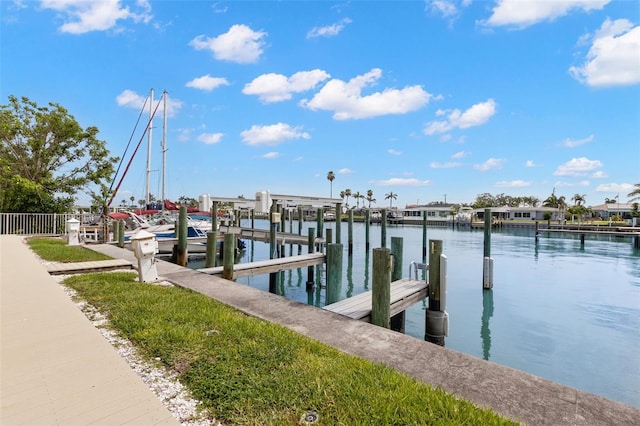 300 Capri Blvd Unit 3, Treasure Island, FL 33706 - dock with a water view and boat lift
