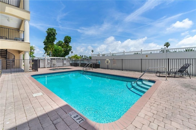 300 Capri Blvd Unit 3, Treasure Island, FL 33706 - community pool featuring a community hot tub and a patio area