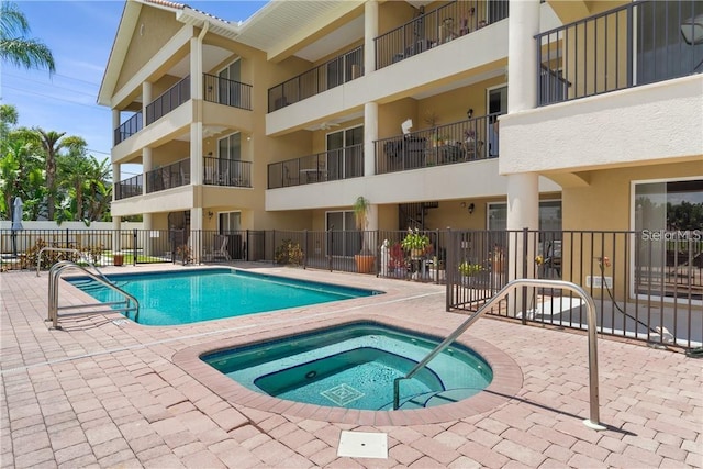 300 Capri Blvd Unit 3, Treasure Island, FL 33706 - community pool with a hot tub and a patio