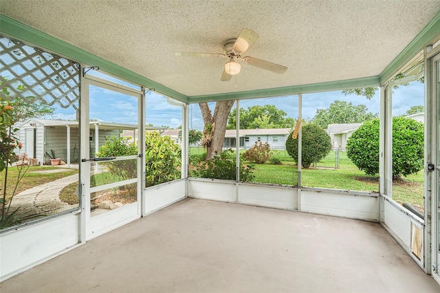 6131 17th St, Zephyrhills, FL 33542 - unfurnished sunroom featuring ceiling fan and healthy amount of natural light