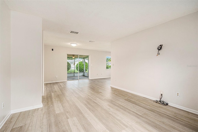 6131 17th St, Zephyrhills, FL 33542 - spare room with light wood-type flooring