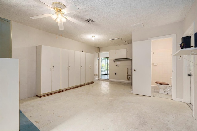 6131 17th St, Zephyrhills, FL 33542 - garage featuring ceiling fan
