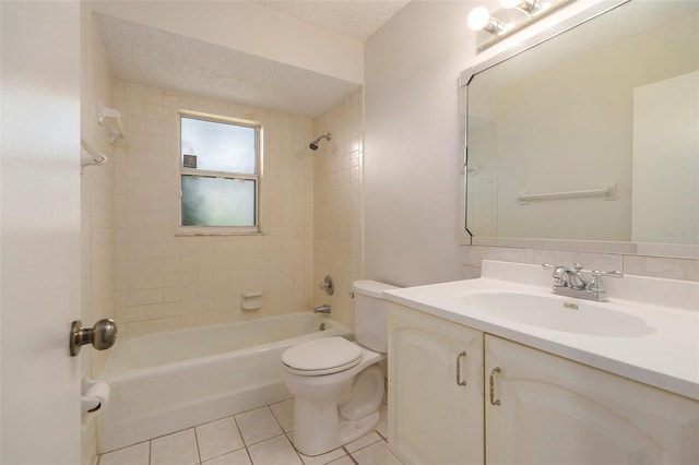 6131 17th St, Zephyrhills, FL 33542 - bathroom featuring tile patterned floors, vanity, shower / washtub combination, and a textured ceiling