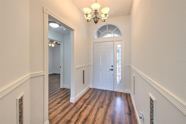 10505 Goldwater Ln, Riverview, FL 33578 - foyer entrance with a chandelier and dark wood-type flooring