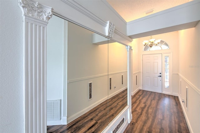 10505 Goldwater Ln, Riverview, FL 33578 - entryway with a chandelier and dark wood-style floors