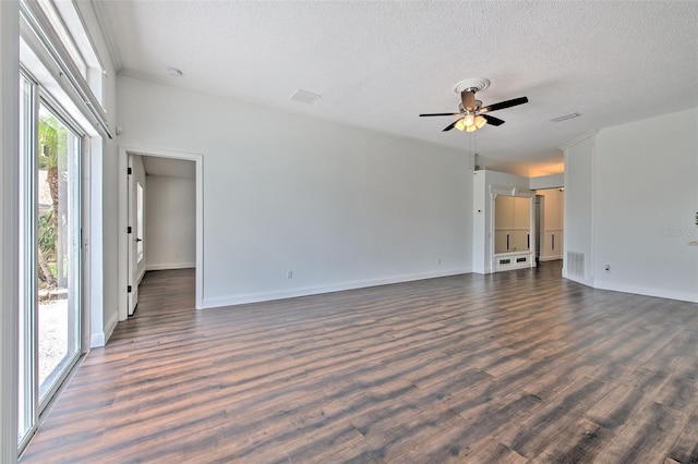 10505 Goldwater Ln, Riverview, FL 33578 - unfurnished room with a textured ceiling, dark wood-style floors, and a ceiling fan