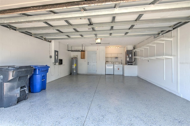 10505 Goldwater Ln, Riverview, FL 33578 - garage featuring washer and clothes dryer and electric water heater