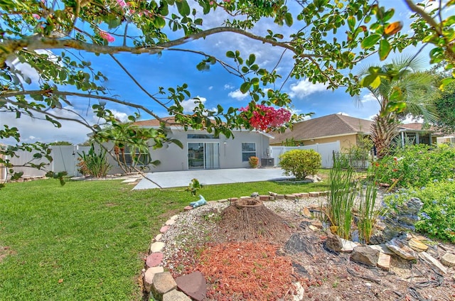10505 Goldwater Ln, Riverview, FL 33578 - fenced backyard with a patio area