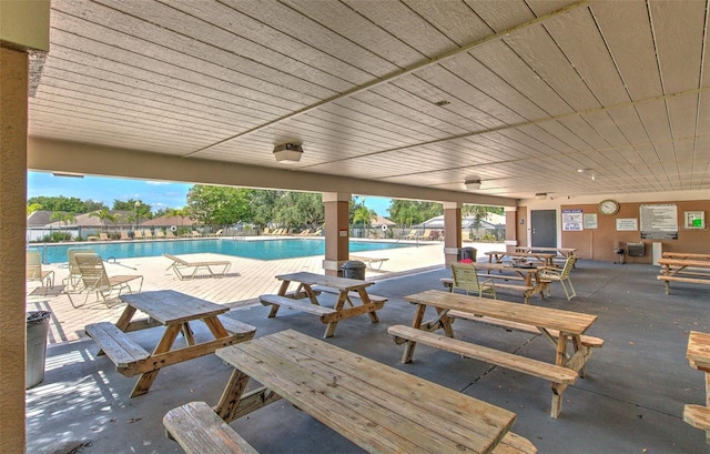 10505 Goldwater Ln, Riverview, FL 33578 - view of patio with a community pool