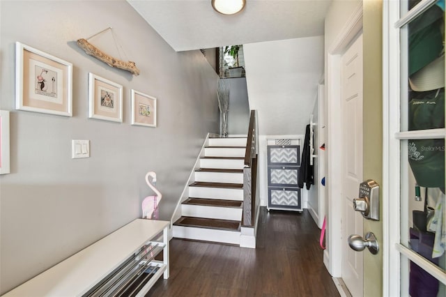 549 Walden Ct, Dunedin, FL 34698 - foyer entrance featuring wood finished floors and stairs