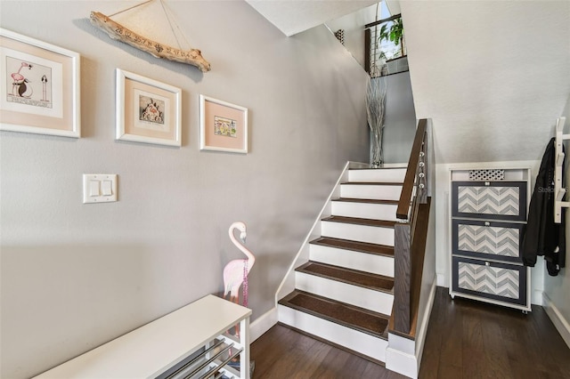 549 Walden Ct, Dunedin, FL 34698 - staircase featuring baseboards and wood finished floors