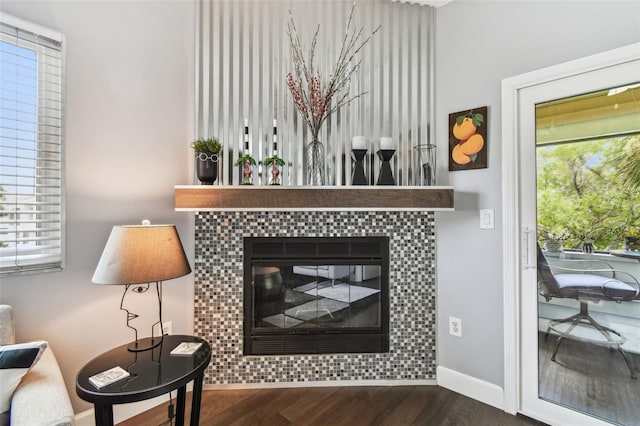 549 Walden Ct, Dunedin, FL 34698 - living area featuring wood finished floors and a fireplace