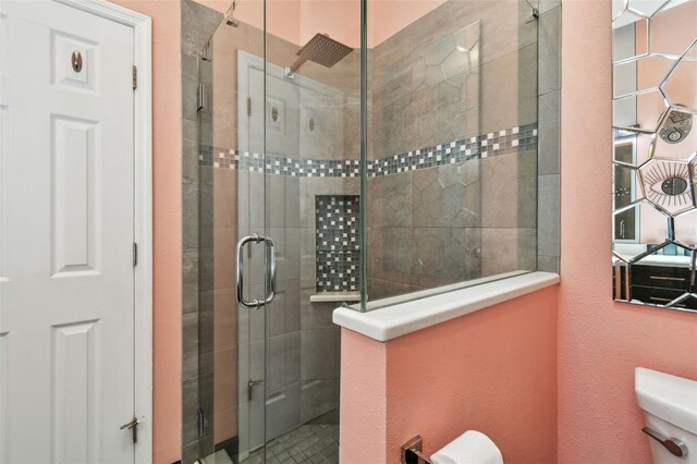 549 Walden Ct, Dunedin, FL 34698 - full bathroom featuring toilet and a stall shower