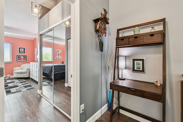 549 Walden Ct, Dunedin, FL 34698 - corridor with baseboards and wood finished floors