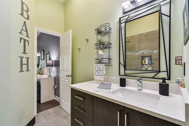 549 Walden Ct, Dunedin, FL 34698 - full bath featuring vanity, tile patterned flooring, and a tile shower