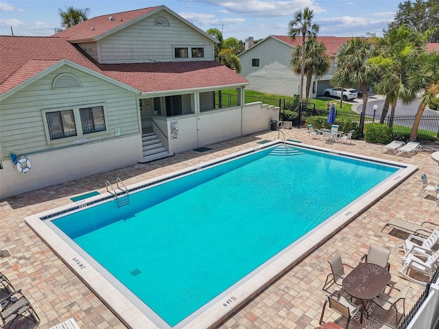 549 Walden Ct, Dunedin, FL 34698 - community pool with a patio