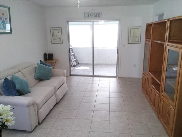 390 301st Blvd W Unit 8D, Bradenton, FL 34205 - living area featuring light tile patterned flooring