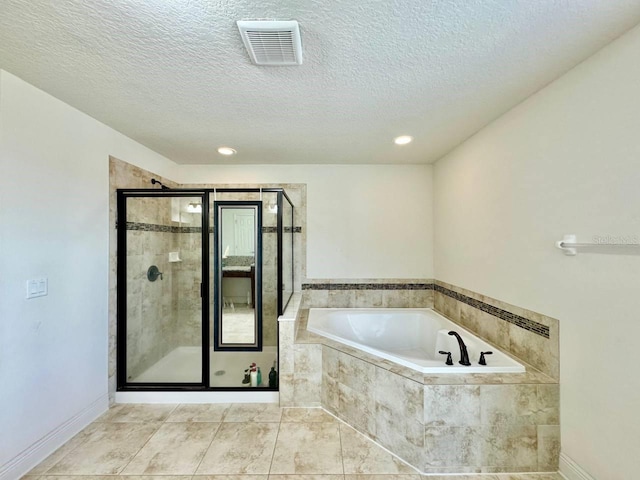 19502 Sea Myrtle Way, Tampa, FL 33647 - bathroom featuring a garden tub, a stall shower, a textured ceiling, tile patterned flooring, and recessed lighting