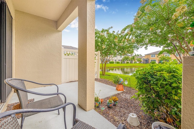 9237 Fox Sparrow Rd, Tampa, FL 33626 - view of patio / terrace with a water view