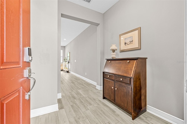 9237 Fox Sparrow Rd, Tampa, FL 33626 - foyer entrance featuring baseboards and light wood finished floors