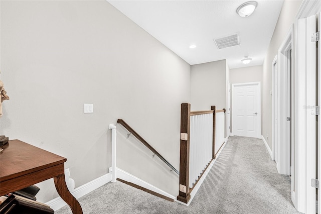 9237 Fox Sparrow Rd, Tampa, FL 33626 - corridor with an upstairs landing and light colored carpet