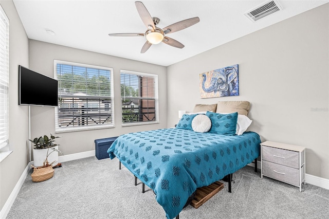 9237 Fox Sparrow Rd, Tampa, FL 33626 - bedroom featuring carpet and ceiling fan