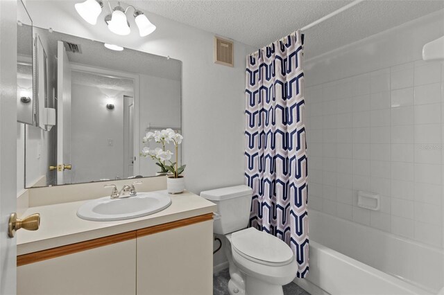 5920 80th St N Unit 308, Saint Petersburg, FL 33709 - bathroom with vanity, a textured ceiling, and shower / bath combo