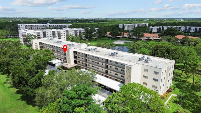 5920 80th St N Unit 308, Saint Petersburg, FL 33709 - bird's eye view of apartment complex and a nearby body of water